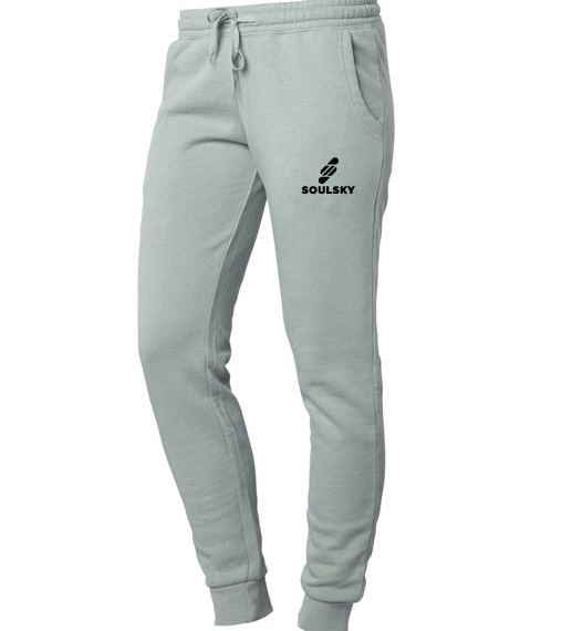 Sage green women's joggers with black embroidered logo on left thigh that says "SOULSKY".