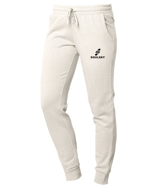 Beige women's joggers with black embroidered logo on left thigh that says "SOULSKY".