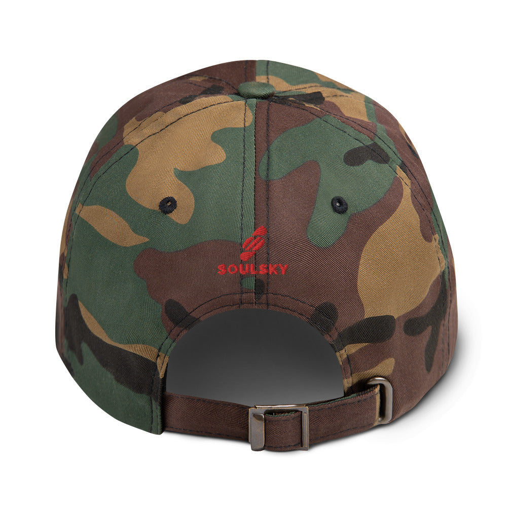 Back of camouflage dad hat. Embroidered red logo that says "SOULSKY". Close up pic.
