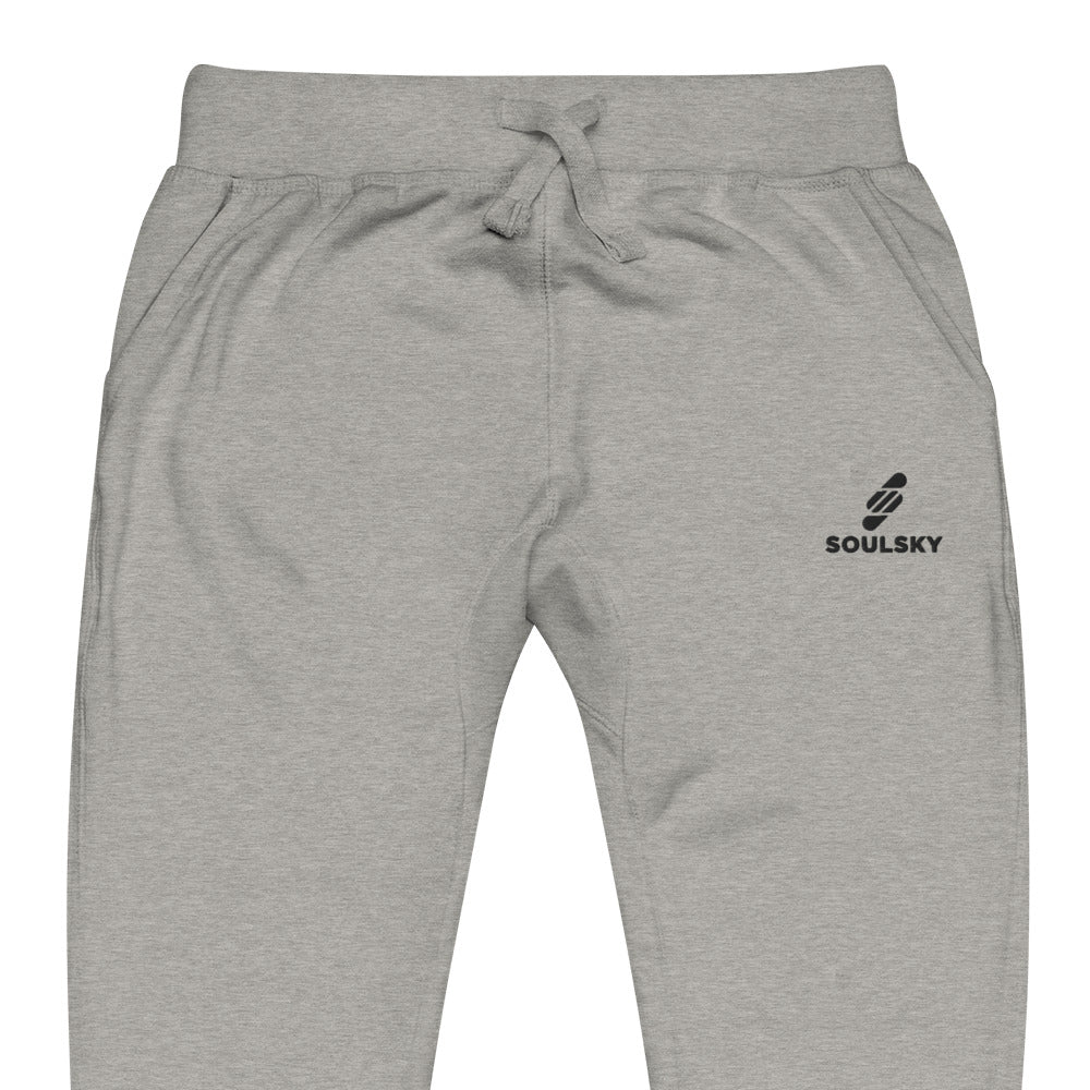 Half pic of light gray unisex joggers with black embroidered logo on left thigh that says "SOULSKY".