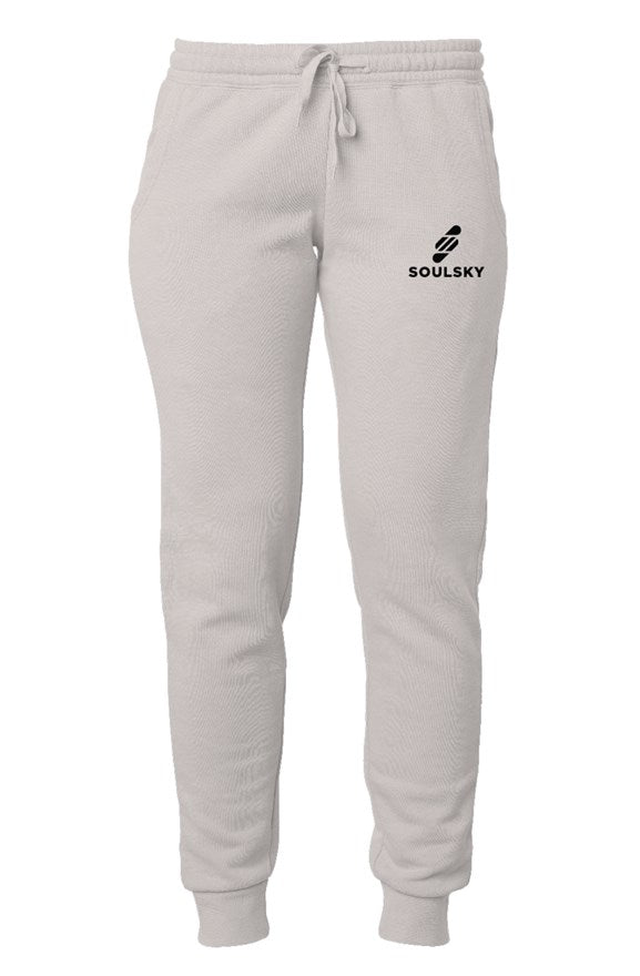 Beige women's joggers with black embroidered logo on left thigh that says "SOULSKY".